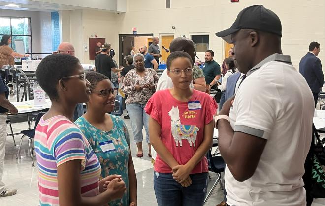 Mayor Yemi speaking with participants of the 2023 Listening Tour