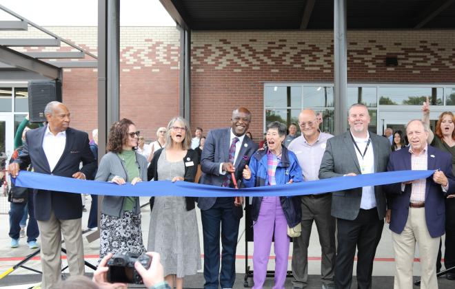 Mayor Yemi and other honored attendees cut the ribbon on the new Colorado Springs Senior Center